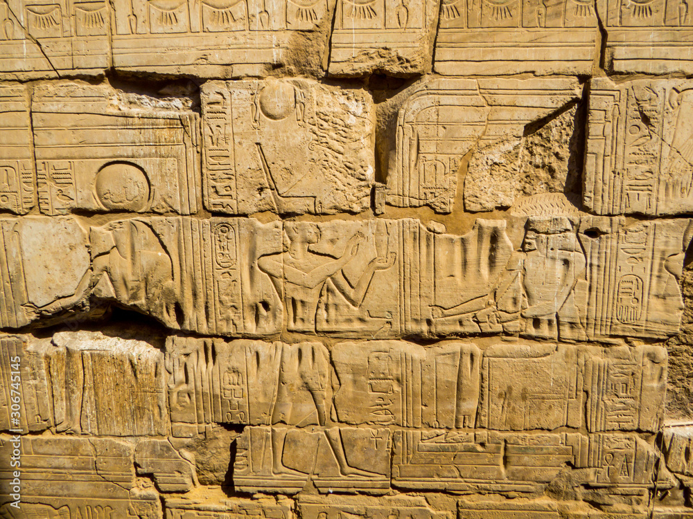 Hieroglyphics in Luxor Temple in Luxor, Egypt Hieroglyphics in Luxor Temple in Luxor, Egypt