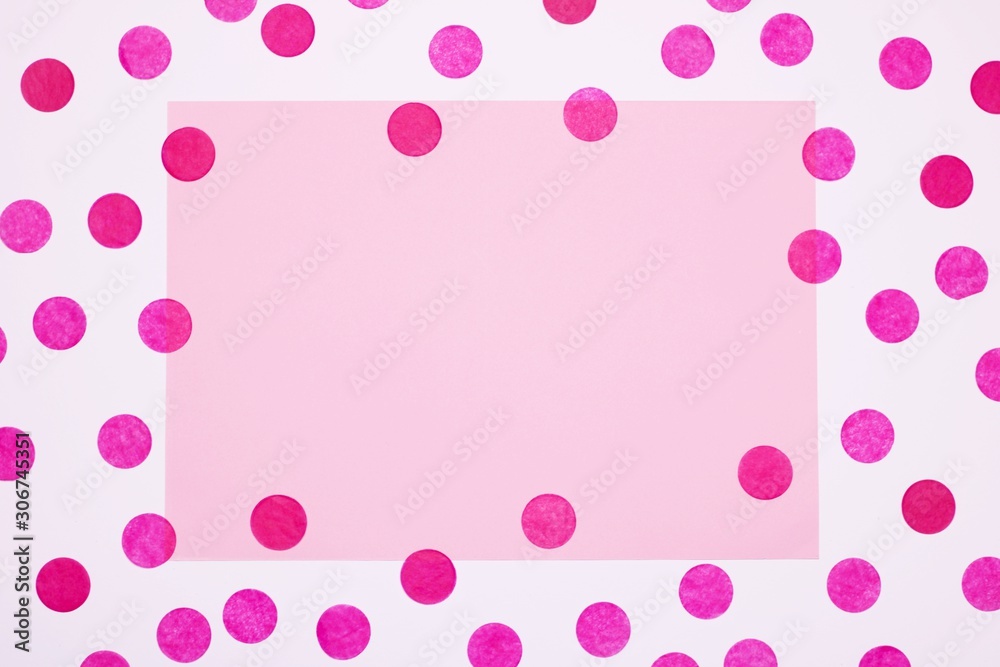 Confetti pink on white background with copy space