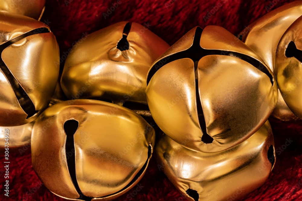 gold bells on red background