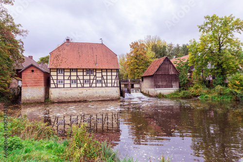 Water mill, river Ems, Rheda Castle, Rheda-Wiedenbrueck, Muensterland region, North Rhine-Westphalia, Germany, Europe © karlo54