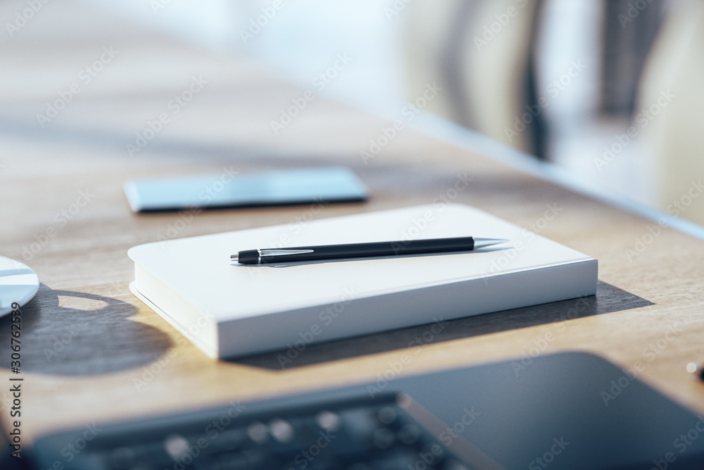 Office table with empty notepad