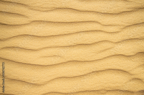 Summer sand dune pattern for background. Close-up of patterns in a sand dune with ripples, sand texture