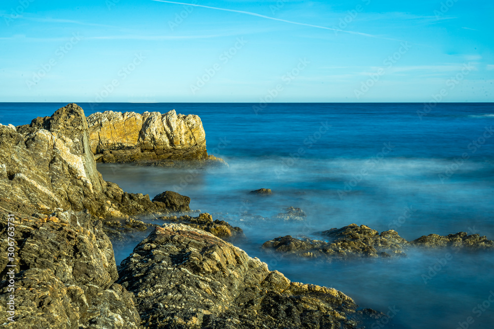 long exposure of rocks at the mediterranean sea near nice