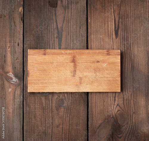 very old empty wooden rectangular cutting board, top view