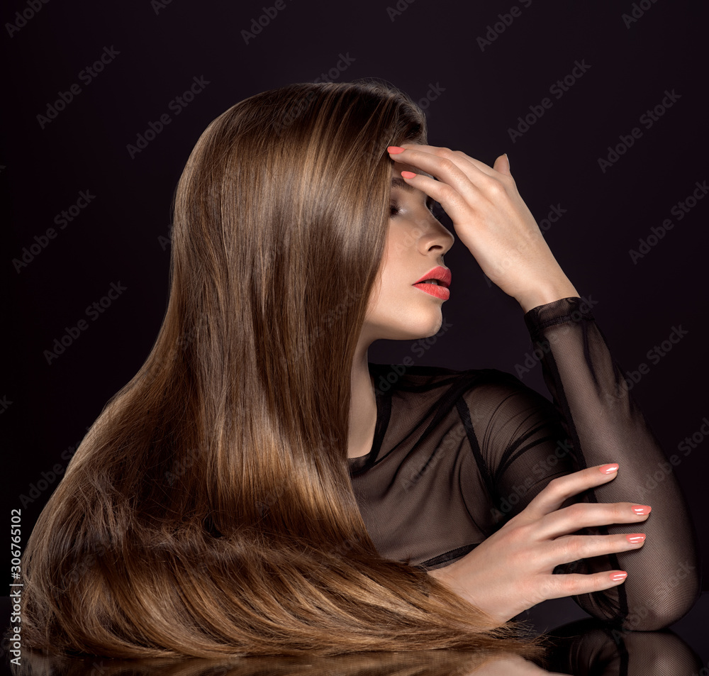 Naklejka premium Woman with beauty long brown hair. Beauty woman with living coral color lipstick on lips.