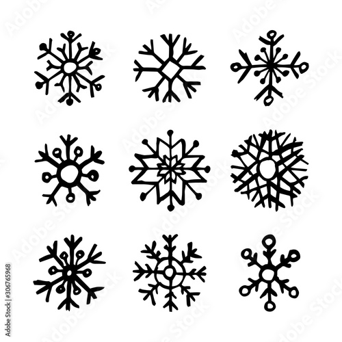 Fototapeta Naklejka Na Ścianę i Meble -  Hand drawn snowflakes on white background