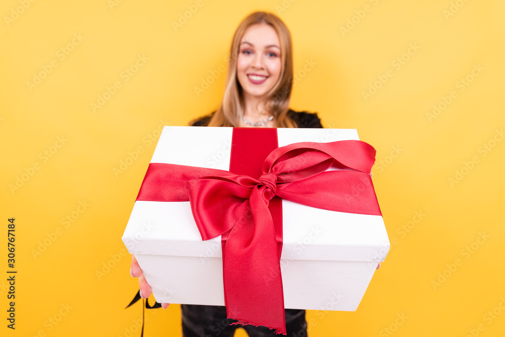 portrait of beautiful smiling girl with gift box portrait of beautiful smiling girl with gift box