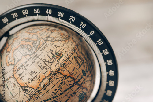 Vintage globe closeup, located on Africa. Concept for travel commercial.   