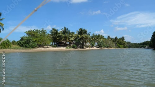 Boating on a small river in San Vicente with banga boat, Palawan, Philipinnes photo