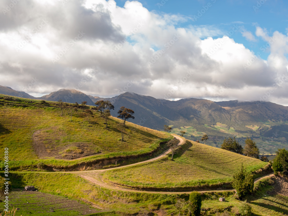 Fototapeta premium Landscape with country roads crossing the farmlands near the colonial town of Chiquiza, in the Central Boyacá Province, part of the Colombian Department of Boyacá.