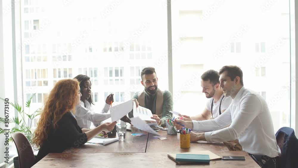 Positive and friendly atmosphere at workplace. Professionals enjoying their jobs and corporate lifestyle. Positive and friendly atmosphere at workplace. Professionals enjoying their jobs and corporate lifestyle.