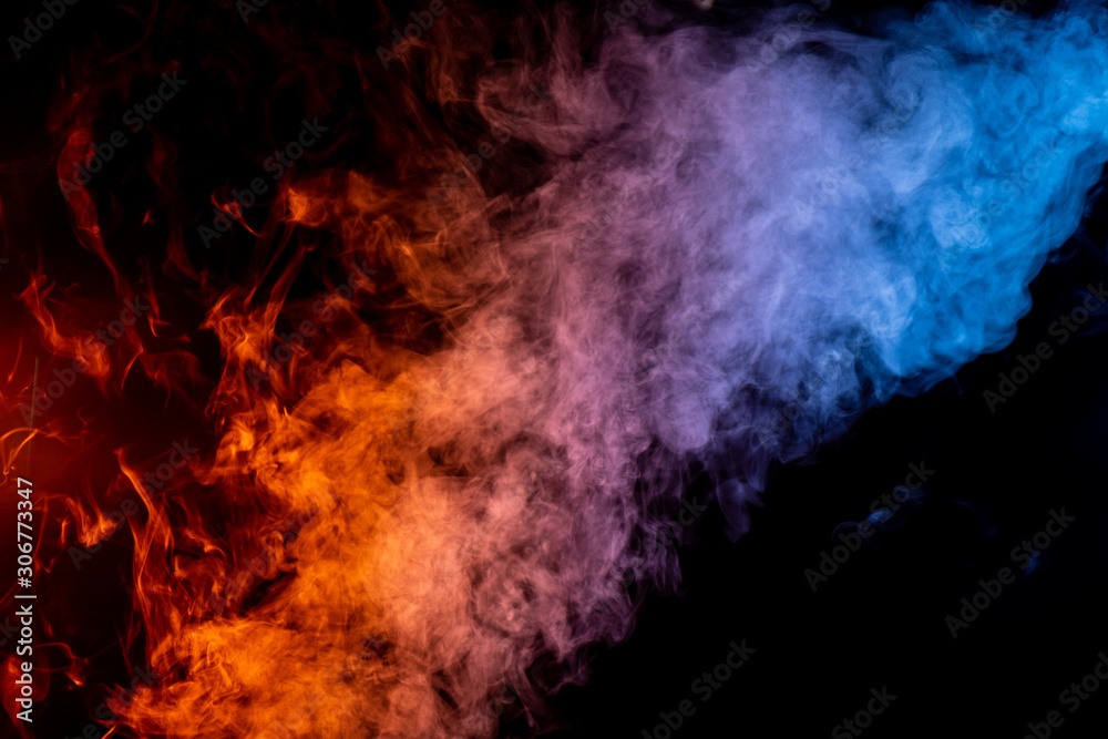Fototapeta premium Orange, Red, and Blue Smoke on Black Background