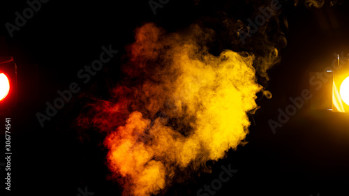 red and yellow smoke on black background