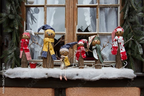 Puppies on the window like Christmas decorations, Riquewihr, Alsace, France 