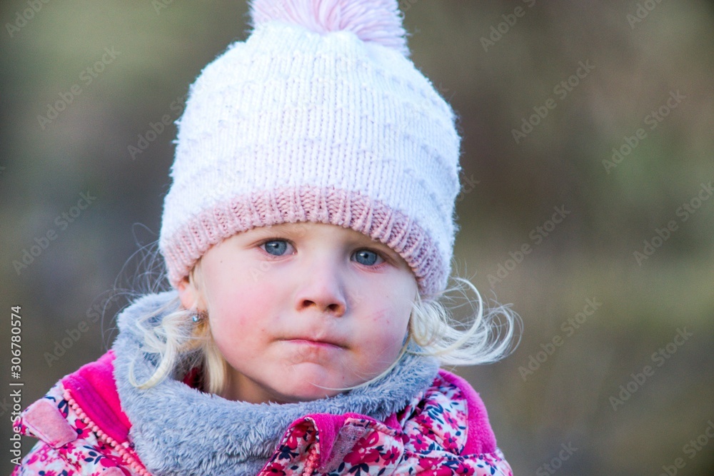 Little girl outdoors in winter nature portrait emotion Little girl outdoors in winter nature portrait emotion
