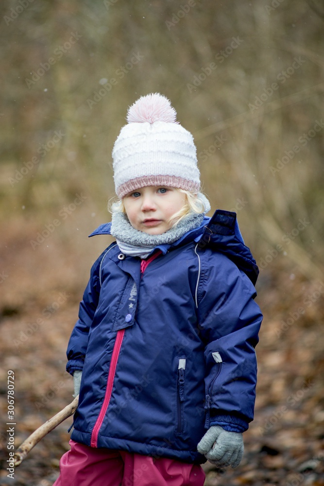Little girl outdoors in winter nature portrait emotion Little girl outdoors in winter nature portrait emotion