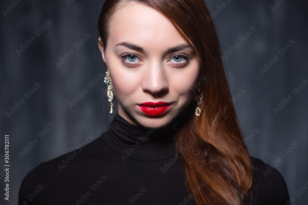 Fototapeta premium Portrait of a young attractive lady
