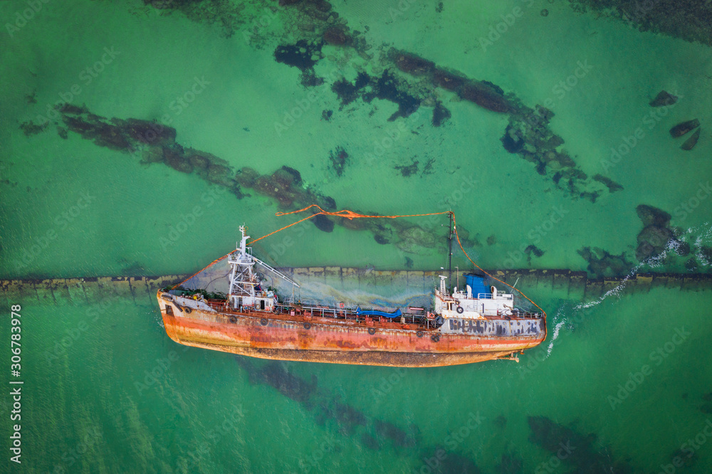 aerial view to flooded oil tanker in water