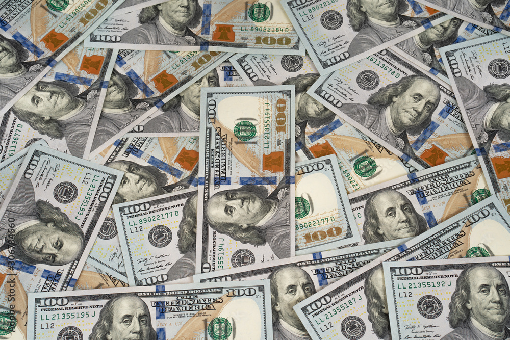 Pile of new design US dollar bills as background. Top view point Pile of new design US dollar bills as background. Top view point