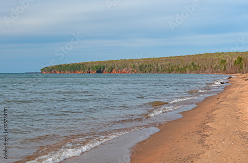 Distant Cliffs on a Quiet Beach