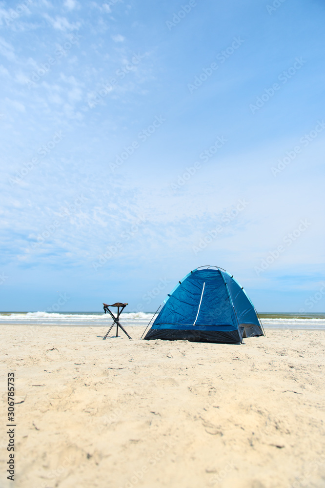 Camping with tent at the beach