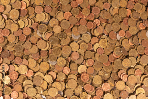 Thousands of golden  silver and copper coins
