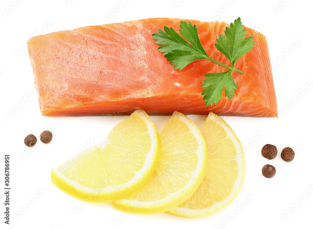 Red fish. Raw salmon fillet with parsley, peppercorns and lemon isolate on white background. Top view Red fish. Raw salmon fillet with parsley, peppercorns and lemon isolate on white background. Top view