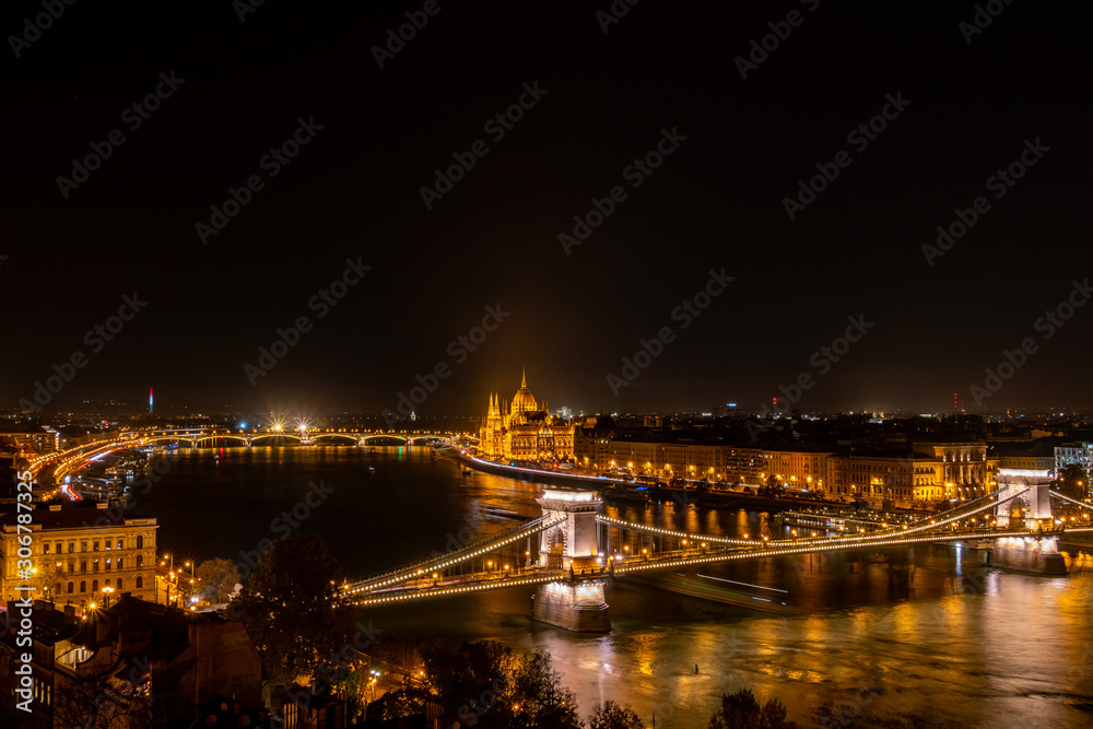 Budapest nightscape, view over bridges and Parliament Building.