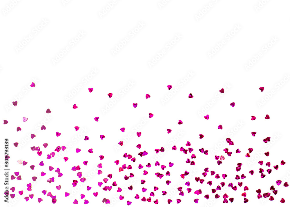 Small hearts-confetti on a white background. Holiday decor Small hearts-confetti on a white background. Holiday decor