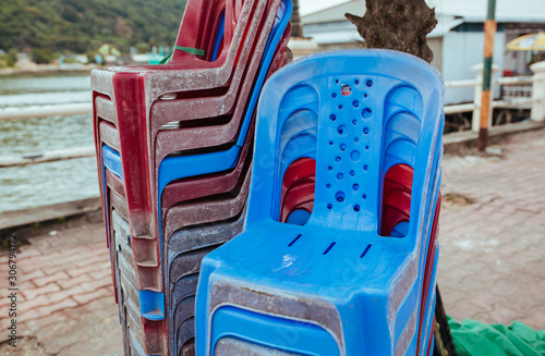Plastic chairs on the street in summer Asia