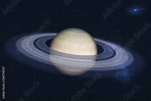 Planet Saturn of solar system in the space with far galaxy on the background. Science fiction. Elements of this image were furnished by NASA