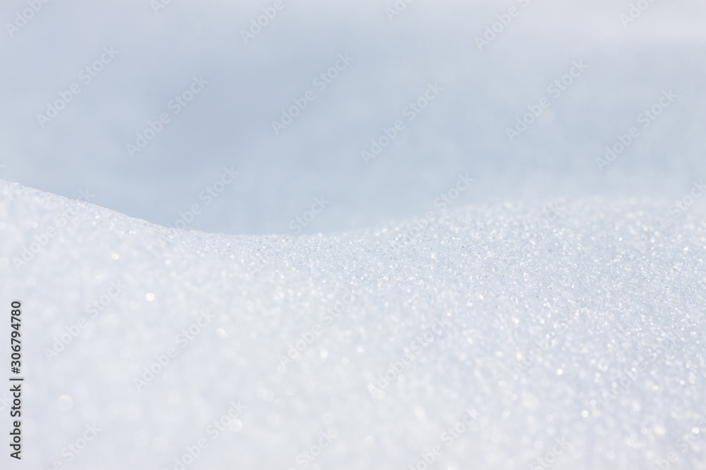 Pure white snow close-up. Blank for design. Beautiful snow background texture