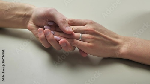 Wallpaper Mural Man put on engagement ring woman finger. Proposal. Romantic moment 4k Torontodigital.ca