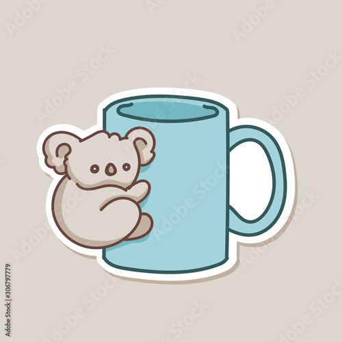 Cute baby koala bear on blue coffee mug photo