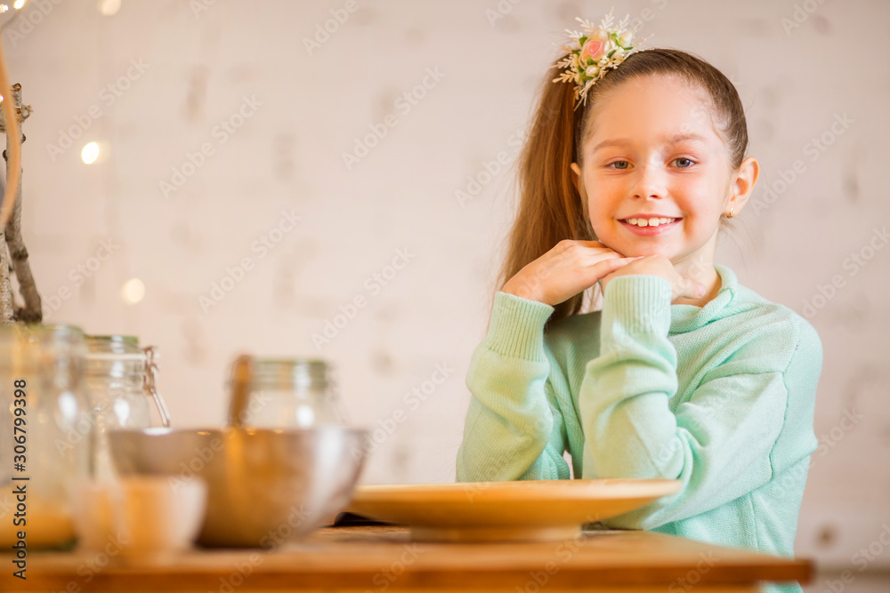 beautiful teenager girl in a festive kitchen beautiful teenager girl in a festive kitchen