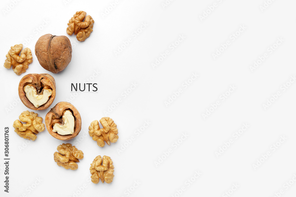 Tasty walnuts on white background Tasty walnuts on white background