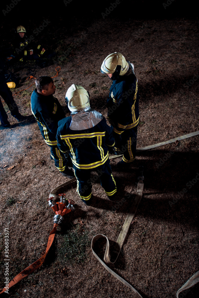 Naklejka premium Firefighting operation at night