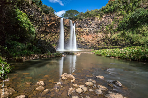 Long exposure of the very scenic Wailua falls on Kauai, from the bottom after a short hike down a very steep cliff.  photo