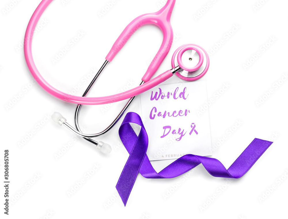 Paper with text WORLD CANCER DAY, stethoscope and purple ribbon on white background Paper with text WORLD CANCER DAY, stethoscope and purple ribbon on white background