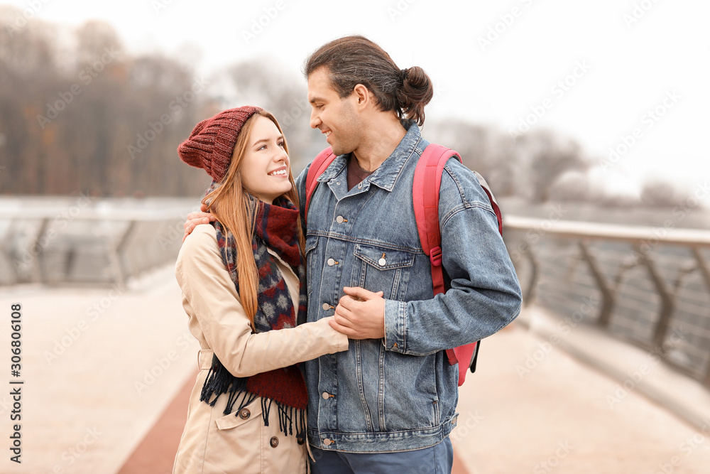 Fototapeta premium Happy couple walking on autumn day