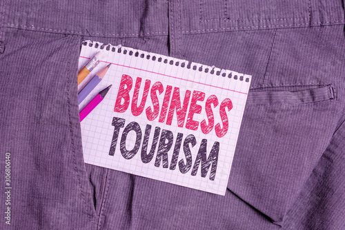 Conceptual hand writing showing Business Tourism. Concept meaning activity of leaving one s is native place for business purpose Writing equipment and white note paper inside pocket of trousers