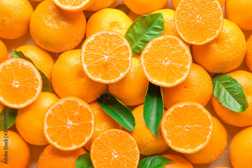 Ripe tasty tangerines as background photo