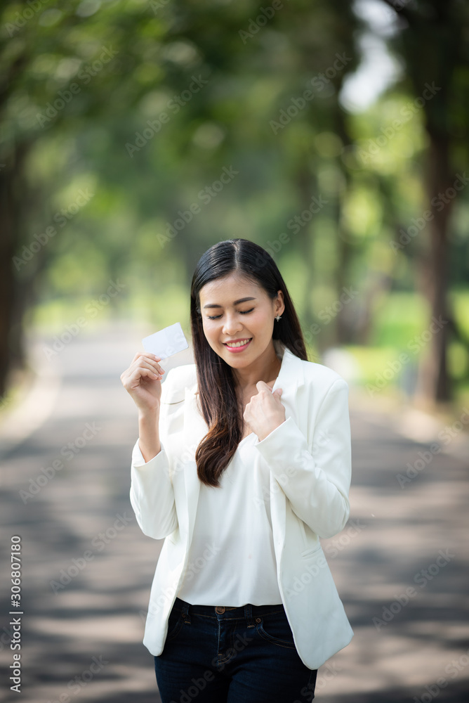 Business women are enjoying the use of credit cards Business women are enjoying the use of credit cards