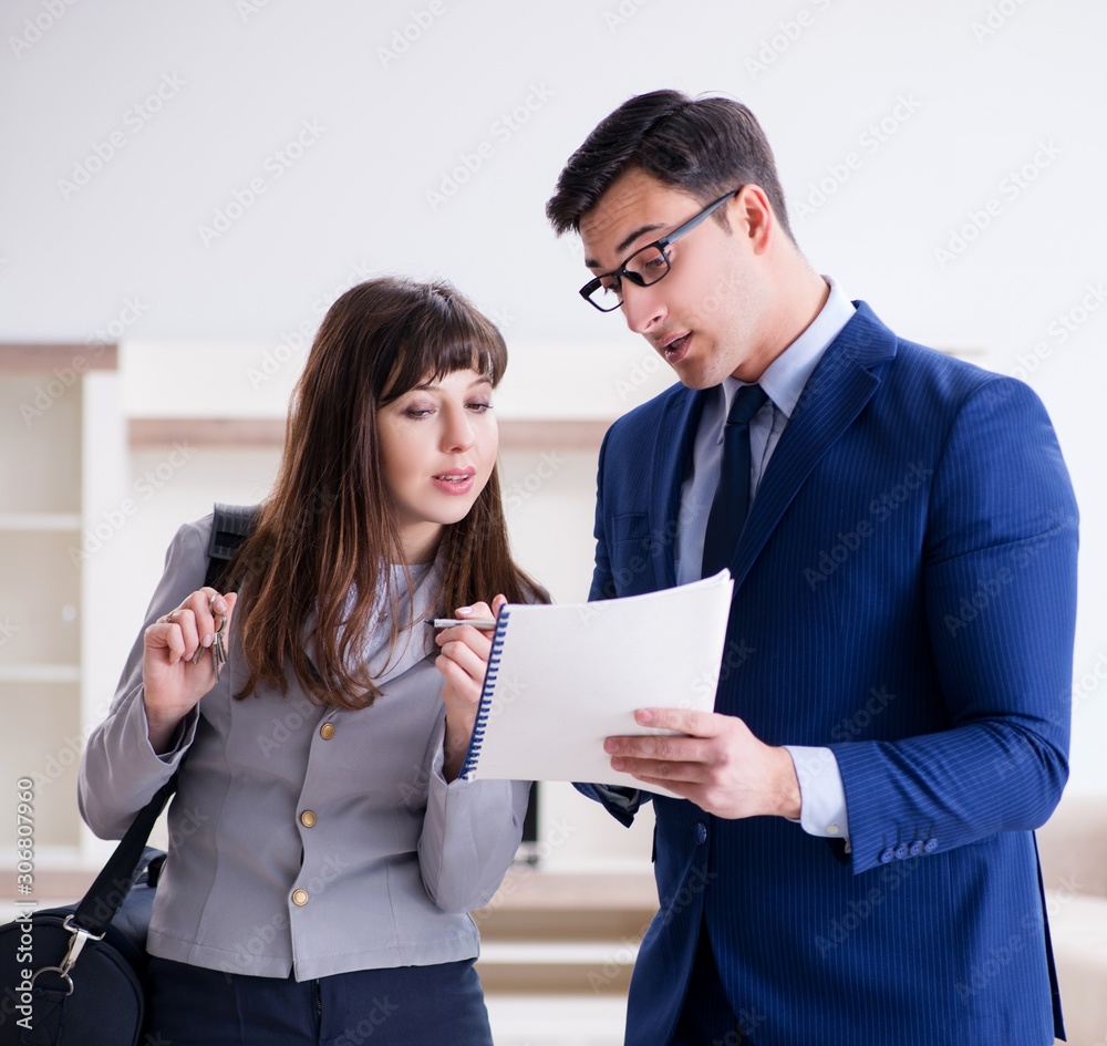 Real estate agent showing new apartment to owner Real estate agent showing new apartment to owner