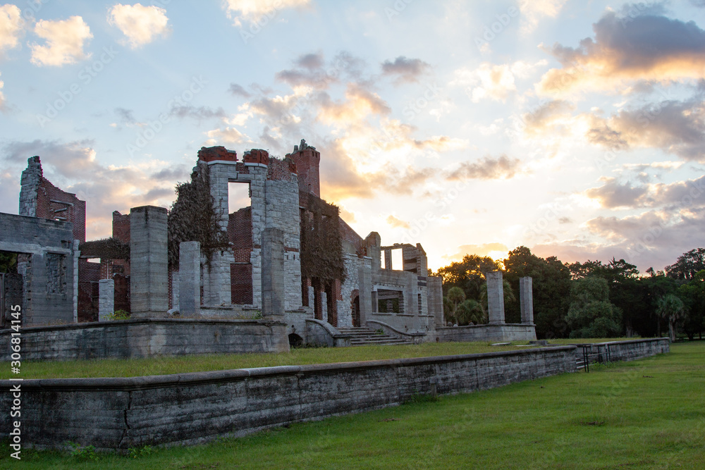 White Mansion Ruins Silhouetted by Bright Sunrise White Mansion Ruins Silhouetted by Bright Sunrise