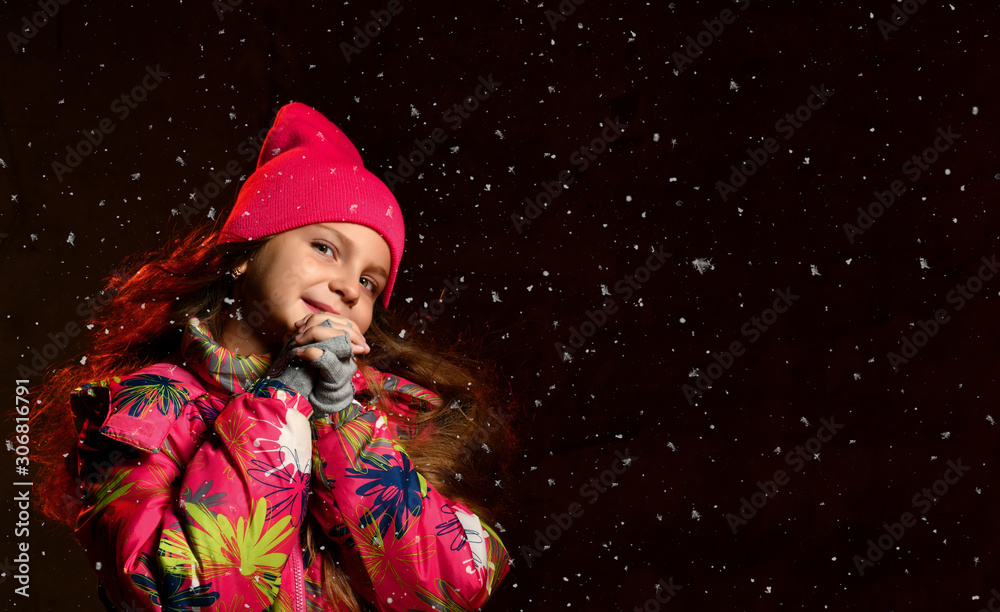 winter, people, happiness concept - woman in hat, muffler and gloves on dark winter, people, happiness concept - woman in hat, muffler and gloves on dark