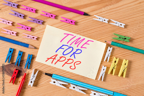 Handwriting text Time For Apps. Conceptual photo The best fullfeatured service that helps communicate faster Colored clothespin papers empty reminder wooden floor background office photo