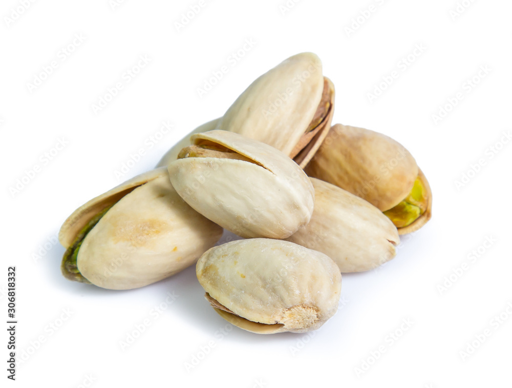 Pistachio nuts. Isolated on a white background Pistachio nuts. Isolated on a white background