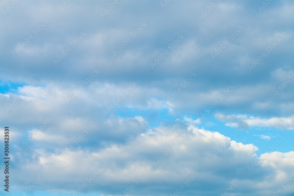 Idylic blue sky with fluffy cloud sunset Idylic blue sky with fluffy cloud sunset