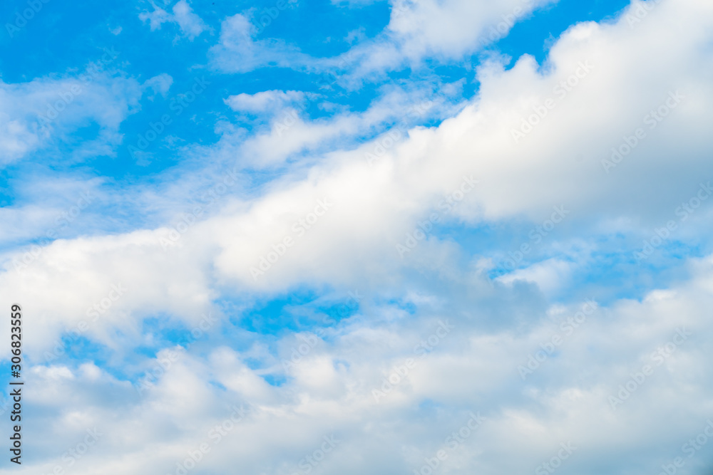 Idylic blue sky with fluffy cloud sunset Idylic blue sky with fluffy cloud sunset